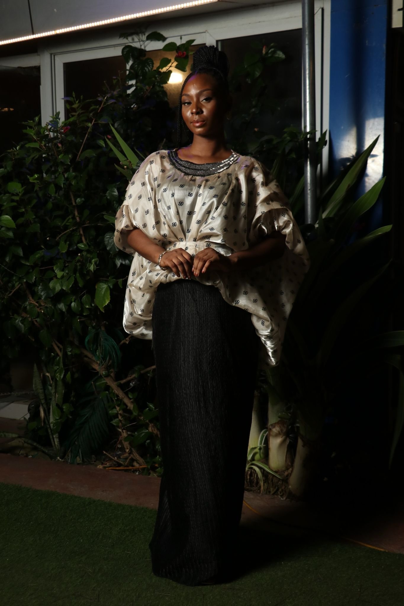 Off-White Patterned Top and Black Skirt Ensemble