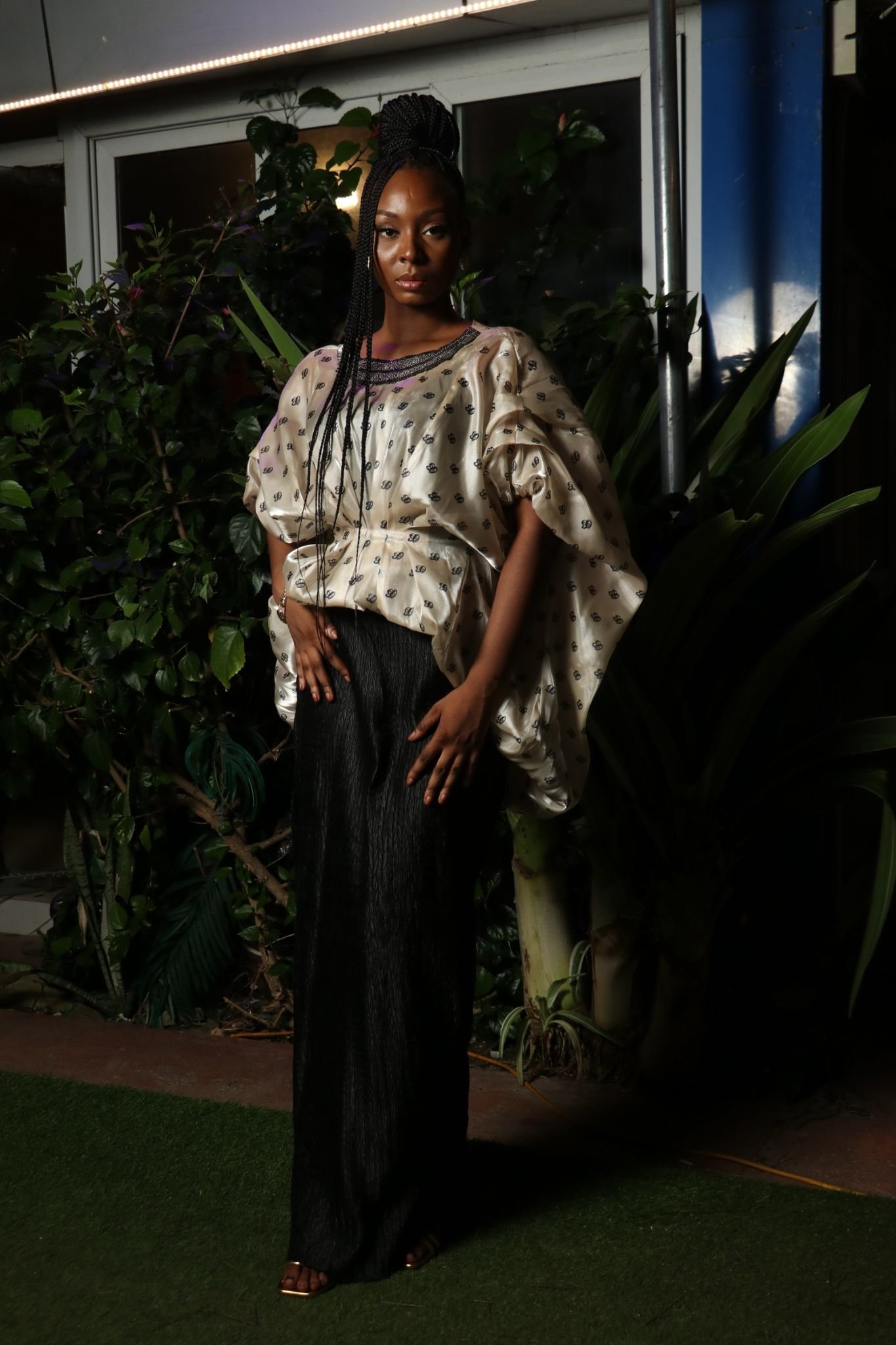 Off-White Patterned Top and Black Skirt Ensemble